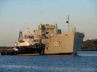 FINAL GOODBYES: ex-HMAS Tobruk leaves Bundaberg Port on her way to her final resting place off the coast of Wide Bay. Picture: Ben Turnbull