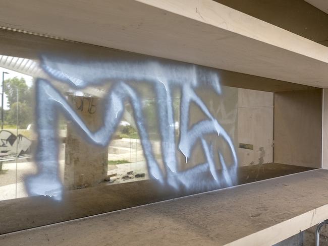 “MTS” was sprayed on smashed walls and furniture in a public building destroyed by criminal vandalism. Picture: AAP Image/Luis Enrique Ascui