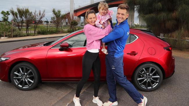 Shaun Higgins with his wife Heidi and daughter Rosie, 22 months. Picture: Alex Coppel