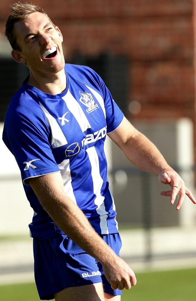 Kangaroo Drew Petrie reacts to kicking a behind at training. Picture: Colleen Petch
