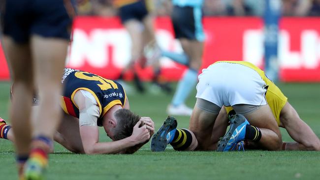 Brayden Cook and Toby Nankervis after their clash of heads. Picture: AFL Photos via Getty Images