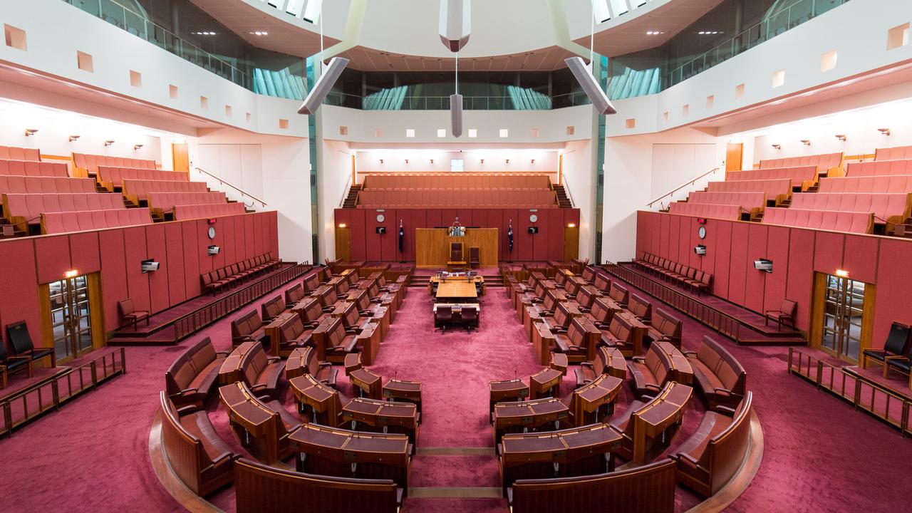 The Senate has red seats and carpet in its chamber, where 76 Senators review Bills passed earlier in the House of Representatives. Picture: iStock