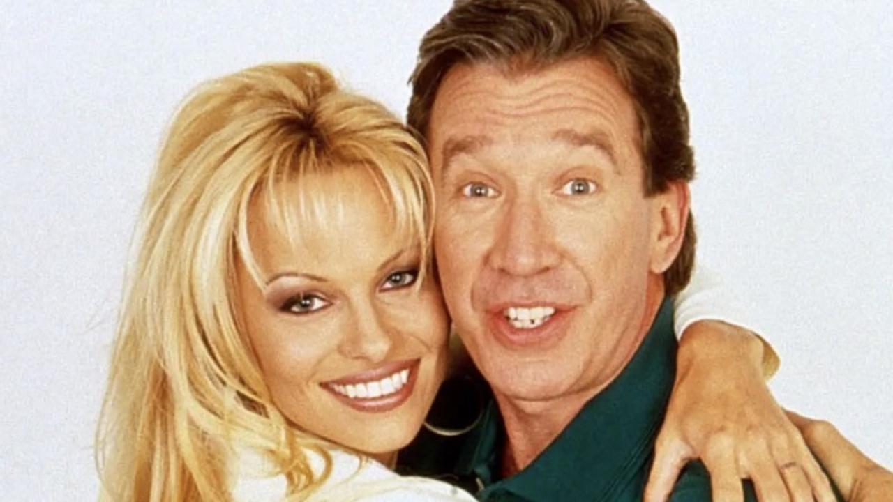 Pamela Anderson and Tim Allen in Home Improvement.