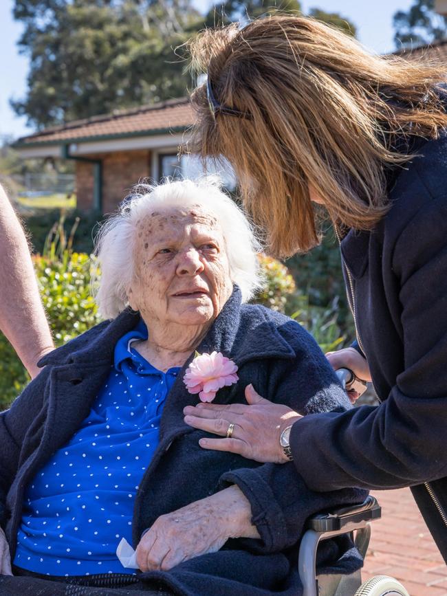 Dina speaks to her mum-in-law at her care facility in Pambula. Picture: David Rogers