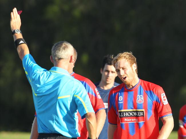 Gold Coast Premier League Soccer. Magic United vs Nerang at Magic United Soccer Fields, Carrara. Nerang's #2 Joe Parsons gets a red card.