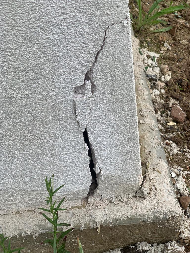 A crack on the site of the Norris home.