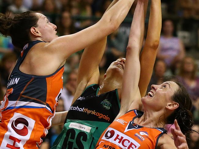 Fever’s Kate Beveridge comes up against Giants ‘twins’ Sam Poolman and Bec Bulley.