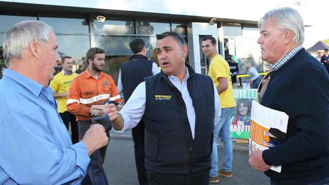 NSW Deputy Premier John Barilaro, centre, talks to constituents in Singleton ahead of the Upper Hunter election. Picture: Peter Lorimer