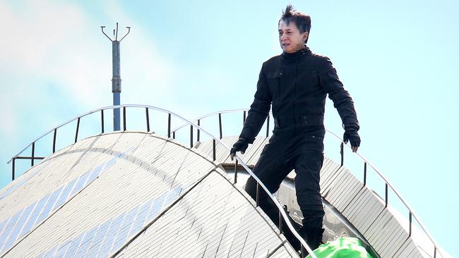 Jackie Chan scaled the Opera House to film a fight scene for his movie. Picture: Chris Pavlich