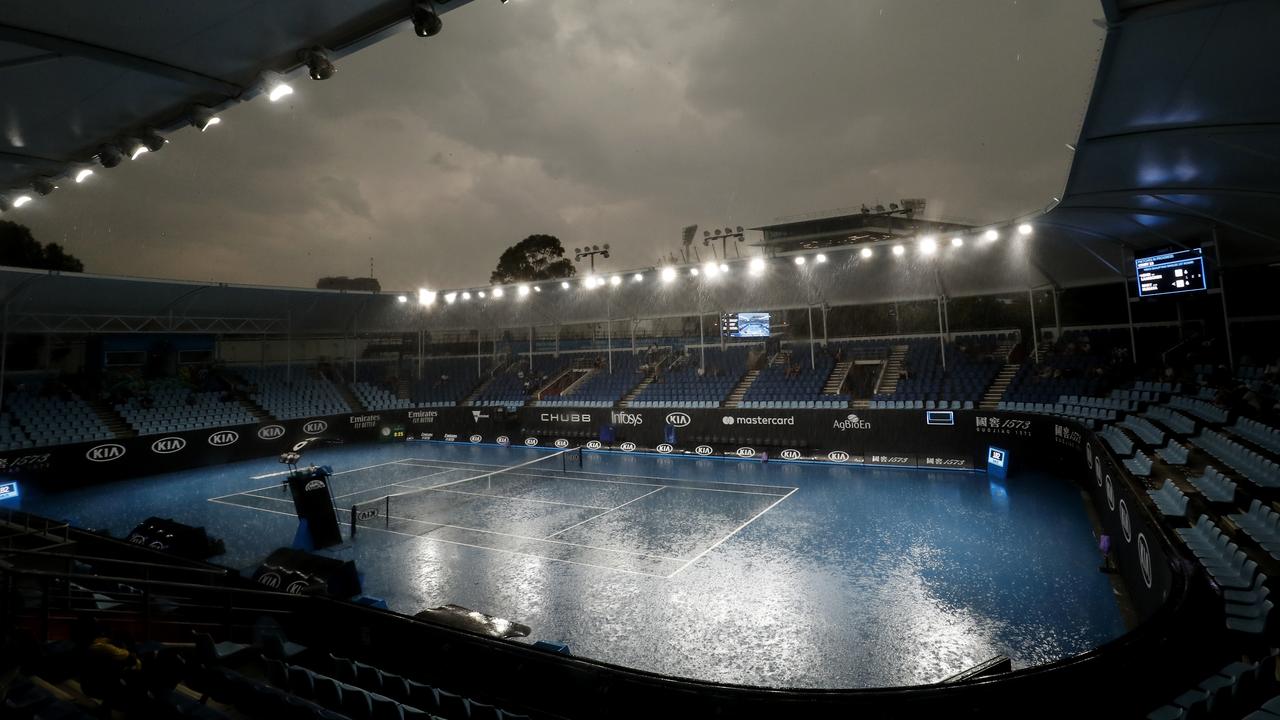 Heavy rain through the afternoon and evening has caused major Australian Open delays. (Photo by Darrian Traynor/Getty Images)
