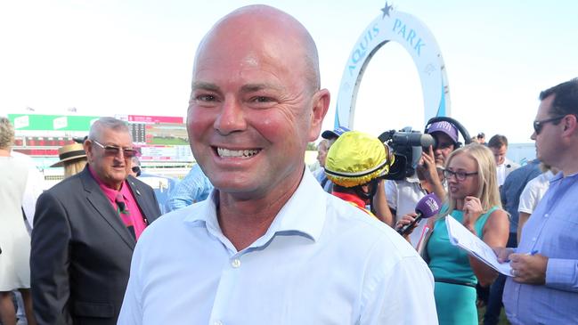 Gold Coast Turf Club race meeting, featuring two major lead in races to the Magic Millions.Photo of race 7. Photo of winner number 9 SNOW VALLEY. Jockey is Robbie Fradd, trainer is Matthew Dunn (pictured).Photo by Richard Gosling