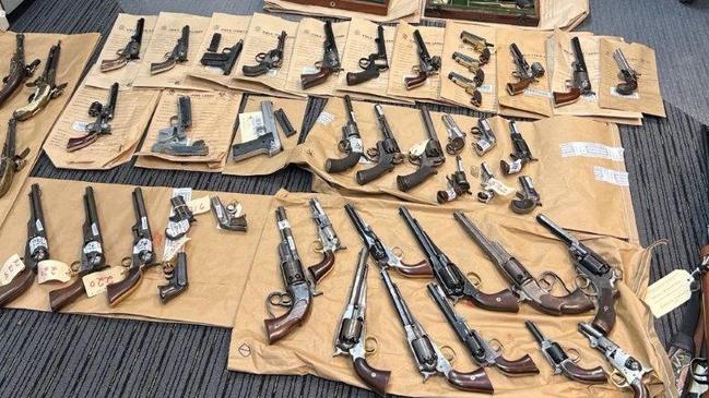 Police allegedly seized a large number of unregistered firearms from a Williamtown property on Tuesday. Picture: NSW Police