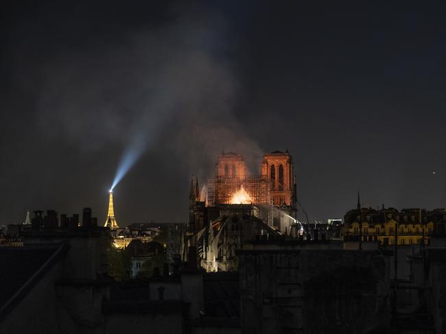 Flames and smoke are seen billowing from the roof at Notre-Dame Cathedral on April 15, 2019 in Paris, France. (Photo by Veronique de Viguerie/Getty Images)