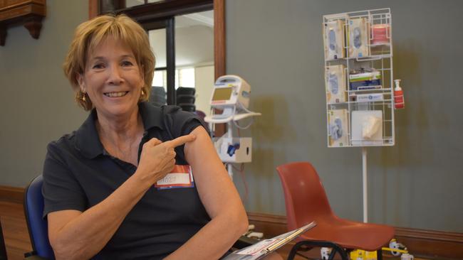 VACCINE HUB: Maryborough resident Jane Dixon proudly shows off where she received her COVID-19 vaccination. Photo: Stuart Fast