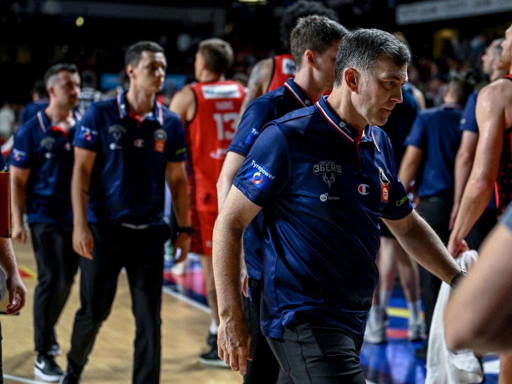 Adelaide coach Mike Wells leaves the court after a third-straight 20-plus-point defeat. Picture: Getty Images