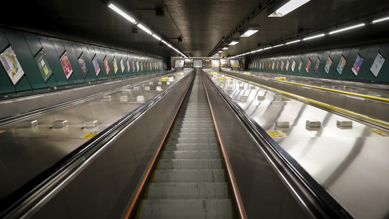 Normally packed train stations were largely empty as protesters snarled the morning rush hour by blocking train and platform doors. Picture: AP