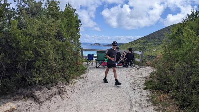 The internet was enraged after a family was snapped hogging an entire viewing platform at Wilsons Promontory National Park. Picture: Reddit