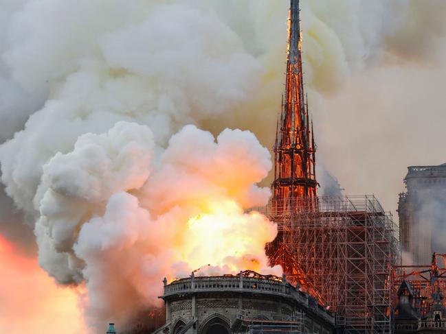 Smoke and flames rise during the fire. Picture: AFP