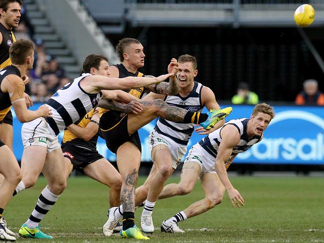 Danger and Dusty’s on-field battles could decide the Brownlow Medal. Picture: Wayne Ludbey