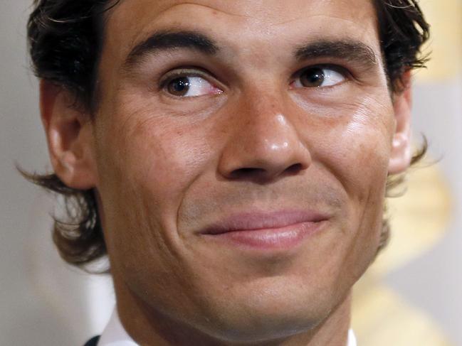 Spain's tennis player Rafael Nadal poses before receiving the Vermeil Medal of the City of Paris on May 21, 2015 in Paris. AFP PHOTO / PATRICK KOVARIK