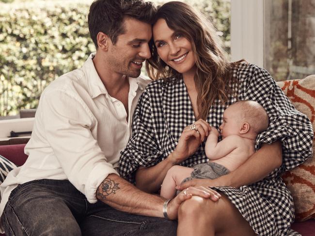 New parents Matty Johnson and Laura Byrne with their daughter Marlie-Mae. Picture: Damian Bennett