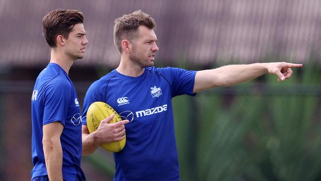 KFC SuperCoach bargain Jy Simpkin, right, with teammate Shaun Higgins. Picture: Michael Klein