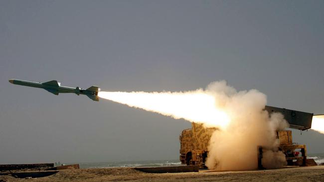 Iran's army naval forces fire a ground-to-sea missile in the Sea of Oman, near Jask, southern Iran.