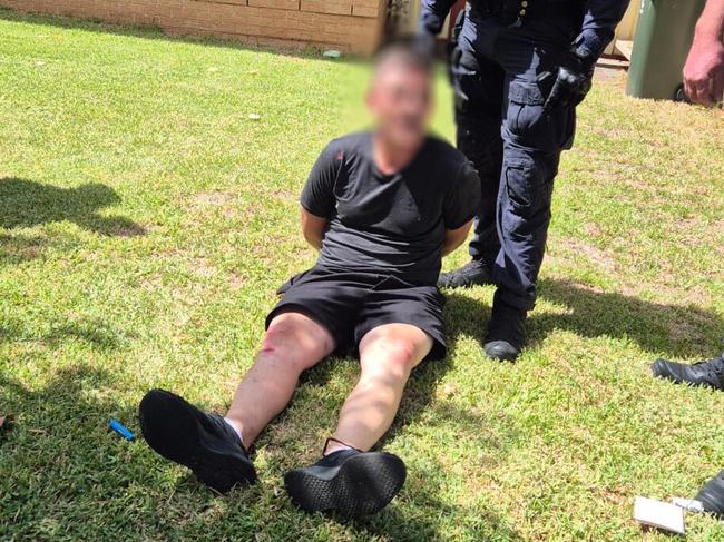 Police arresting Matthew Langford, aged 34, wanted on an outstanding warrant for alleged breach of bail, firearms and traffic offences. Picture: NSW Police