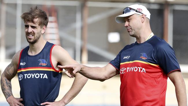 Crows coach Matthew Nicks talks to Jordan Gallucci during a training session at West Lakes. Picture: Sarah Reed