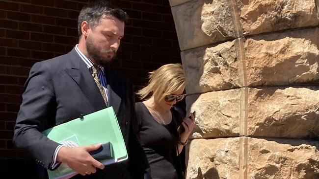 Defence lawyer David Hemsworth and his client Morgan Shotton leave Wellington Local Court on January 19. Picture: Ryan Young