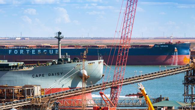 Bulk carriers docked at Port Hedland, where a new berth has just been approved, allowing an expansion of iron ore exports. Picture: Bloomberg via Getty Images