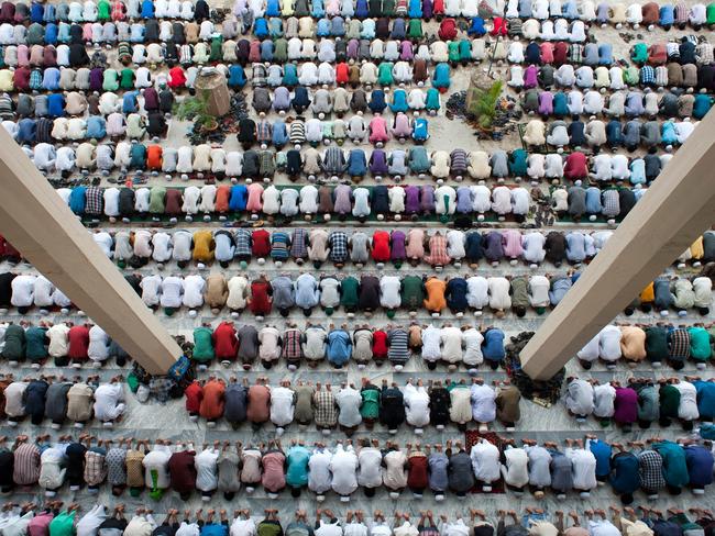 CONTEST WINNER: 'God is Great' by Ripon Barua/Photocrowd.com Location: Chittagong, Bangladesh "From a distance this shot could be a pattern of colours or shapes, perhaps tiles on a floor or bricks on a wall, but look closely and you'll be presented with a mass of bodies in perfectly formed rows. The pillars act as lead-in lines that pull the viewer into the intimate moment of prayer. We particularly like the fact that this scene is one that won't often be witnessed by regular tourists or travel photographers, and the aerial feel of the shot gives us a very unique view of prayer." - reviewed by Digital Photographer magazine