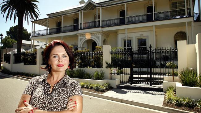 Former property developer Cathy Jayne Pearce in front of her old home, ‘The Myrtles’ in Medindie.