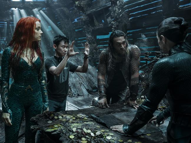 James Wan directs actors Amber Heard, Jason Momoa and Willem Dafoe on the Gold Coast set of film Aquaman. Picture: Warner
