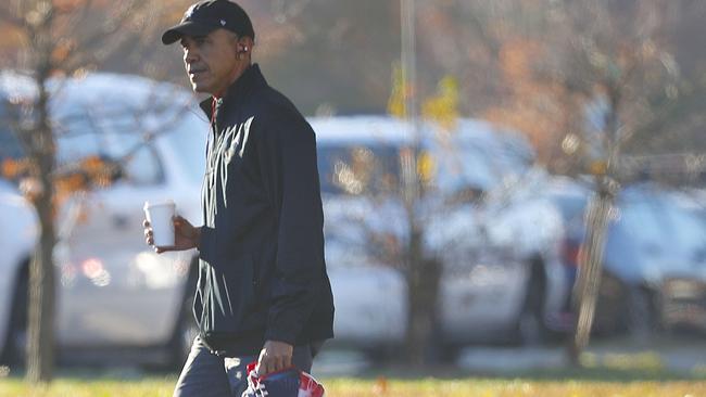 President Barack Obama was spotted carrying out an early election day ritual on Tuesday. Picture: AP Photo/Pablo Martinez Monsivais.