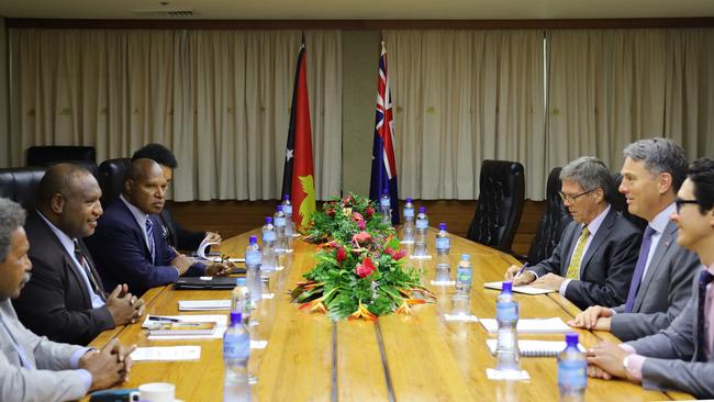 Marles and Marape pictured together at a meeting in Port Moresby.