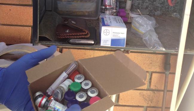 Cash, drugs and Mongols bikie colours found in a Biggera Waters raid. Photos: Supplied.