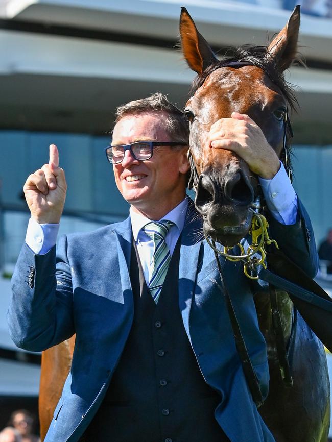 Trainer David Vandyke poses with Alligator Blood.