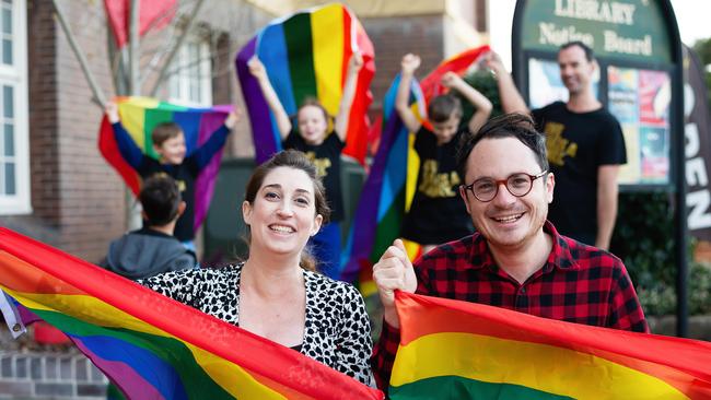 Councillor Anna York pictured with Mathew Howard, co-chair of Rainbow Families outside the Marrickville Library, in a promotional shot around the time the Pride Centre was first proposed. (AAP Image/Monique Harmer)