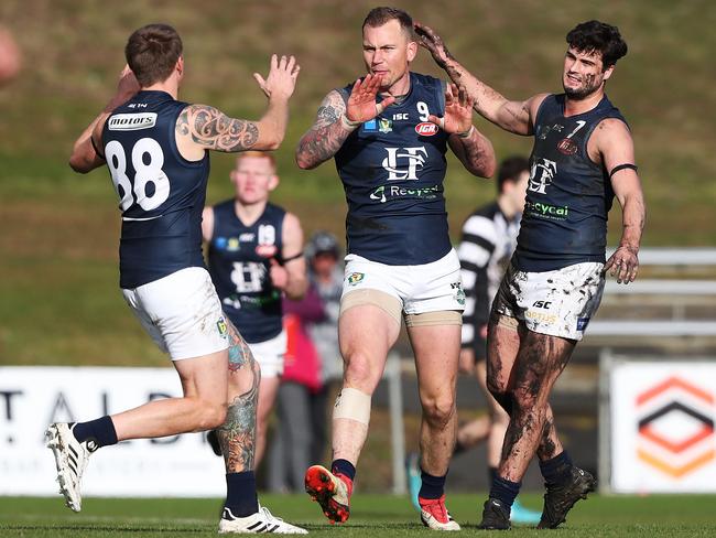 From left, Dylan Riley, Mitch Thorp and Fletcher Seymour celebrate a goal last season. Picture: NIKKI DAVIS-JONES