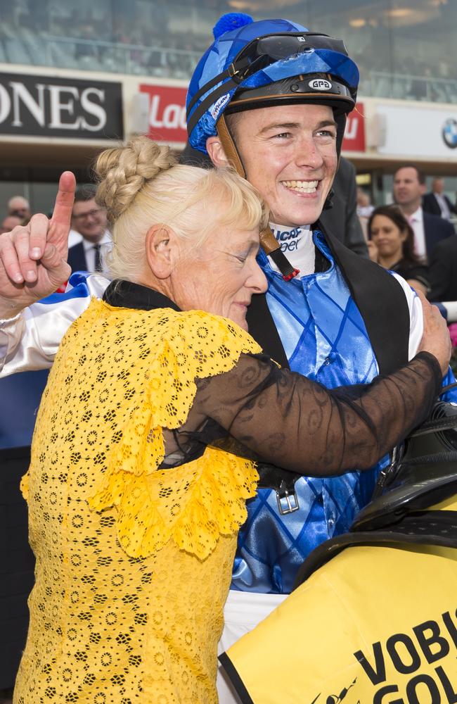 Trainer Udyta Clarke hugs Patrick Moloney after he won on Rich Charm. Picture: Getty Images