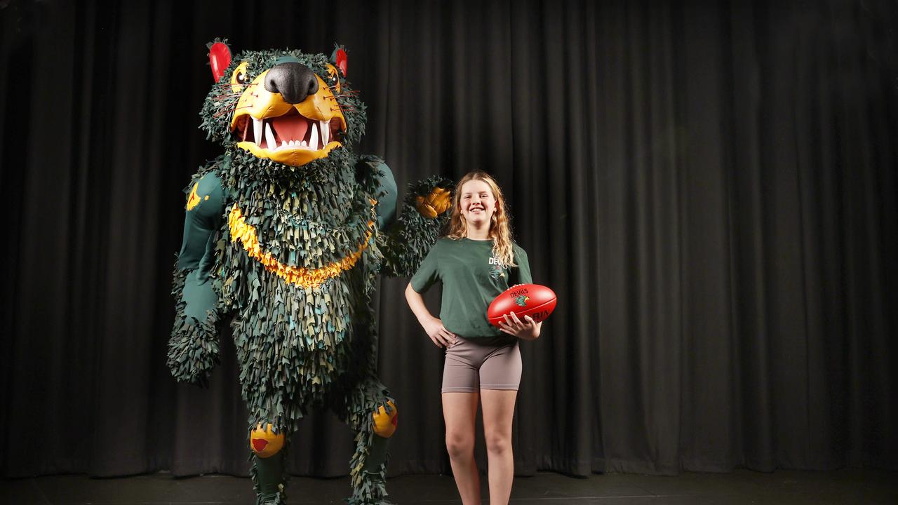 Rum'un with Katie Foale 11 who is a junior football player at North Hobart Football Club and will also co-host the launch with Jack Riewoldt. Launch of the Rum'un the Devil is Tasmania Football Club's first mascot. Picture: Nikki Davis-Jones