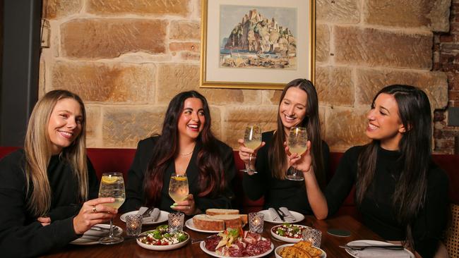 SYDNEY, AUSTRALIA - JULY 09 2023:The rise of bottomless brunches have changed the dating game, with more women day drinking and less likely to go out at night. Alex Rodd, tulin sevgin, Georgia Boward abd Carina Anderson are seen enjoying a bottomless brunch at the Milli Vini in Syrry Hills, Sydney. Picture: Newscorp Daily Telegraph/ Gaye Gerard