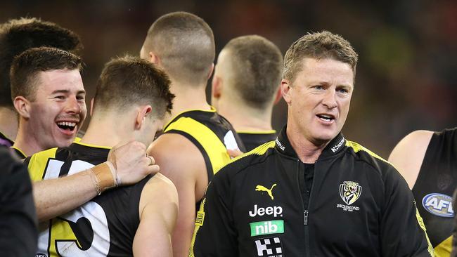 Richmond's Jack Higgins has laugh as coach Damien Hardwick leaves the three-quarter time huddle. Picture: Michael Klein