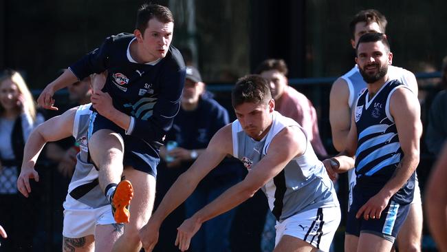 EFNL: Silvan’s Darcy Turnbull gets a kick away. Picture: Hamish Blair