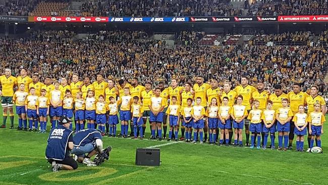 Bundaberg's Waves Falcons junior rugby union players and the Wallabies.