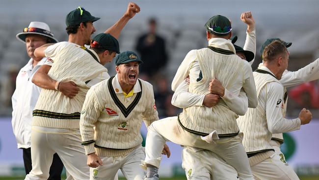 Australia's players after the final wicket. Picture: AFP