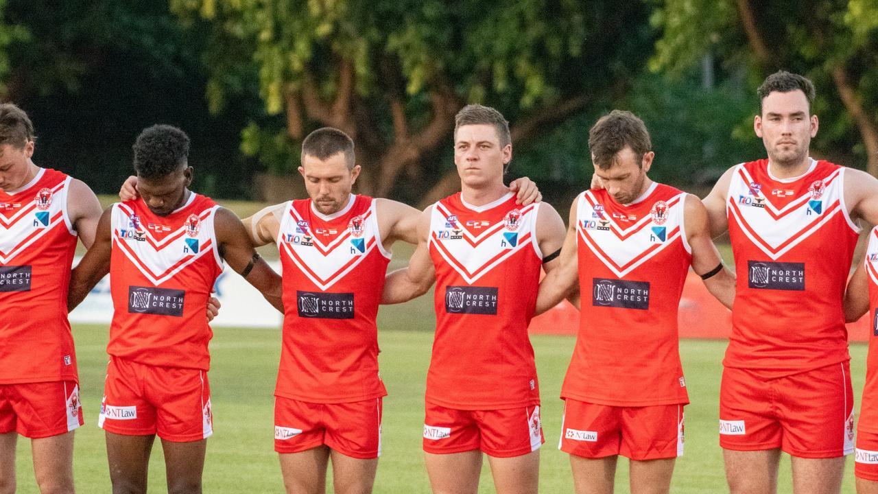 The Waratahs pay tribute to late, great ruckman Alexander ‘Rooch’ Aurrichio at the first game under lights at Gardens Oval. Picture: Aaron Black/AFLNT Media