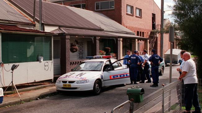 Police outside the house at 87 Doran St, Carrington, where the bodies of Susan Kay and Joanne Teterin were discovered on May 17, 2000. Picture: Robert McKell.