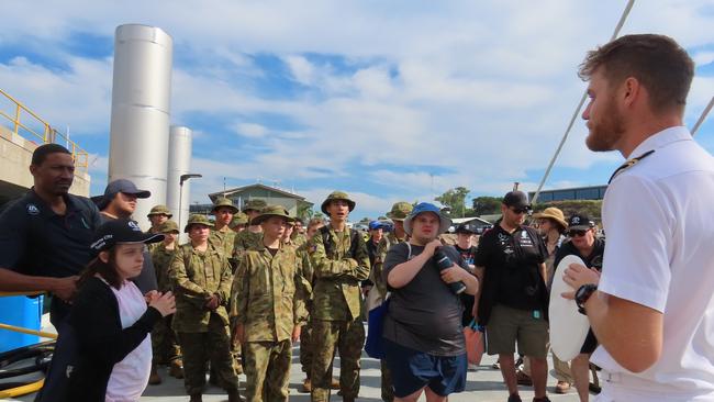 Young Endeavour XO Lt. James Tomlinson briefs visitors to the ship. Picture: Aden Hill